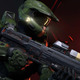 Master Chief holds an assault rifle in a Banished base in Halo Infinite.